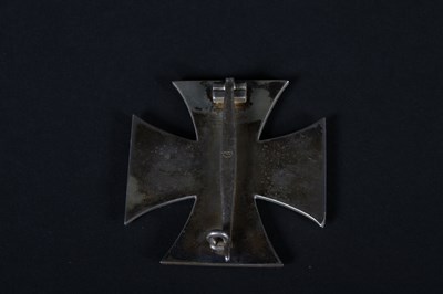 Lot 68 - A German 1939 Iron Cross medal, on a white...