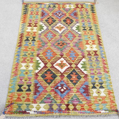 Lot 328 - A modern kilim rug, with all over coloured...