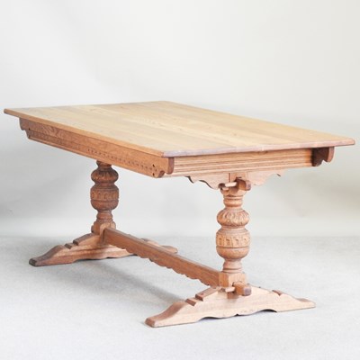 Lot 458 - An Old Charm style light oak refectory dining...