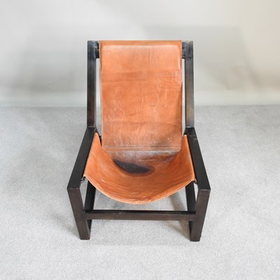 Lot 17 - A Nkuku mid century leather sling chair, with...
