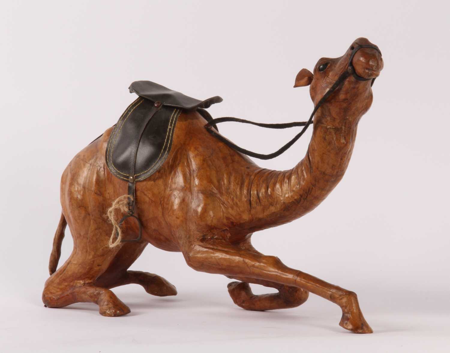 Lot 36 - A Liberty-style leather-clad model of a camel...