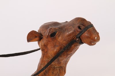 Lot 36 - A Liberty-style leather-clad model of a camel...
