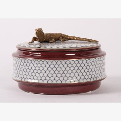 Lot 241 - A decorative porcelain box, the lid in the...