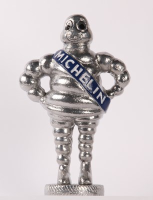Lot 710 - A metal figure of the Michelin man