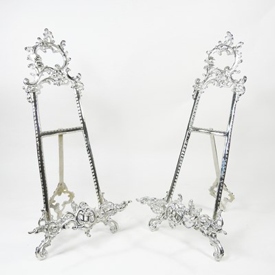 Lot 130 - A pair of ornate plated table easels, with...