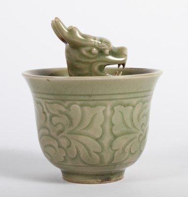 Lot 730 - A Chinese celadon glazed porcelain tea bowl,...