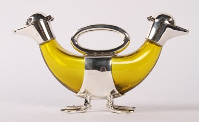 Lot 93 - A silver plated and yellow glass double claret...