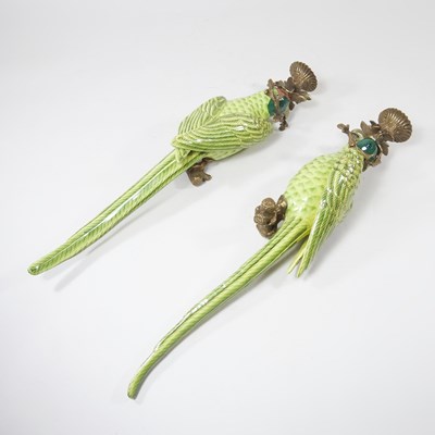 Lot 142 - A pair of continental porcelain and gilt...