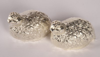 Lot 142 - A pair of silver plated condiments, in the...