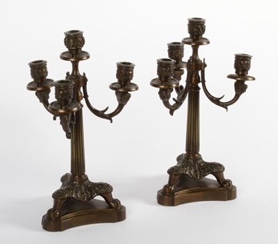 Lot 53 - A pair of Empire style bronze four sconce...