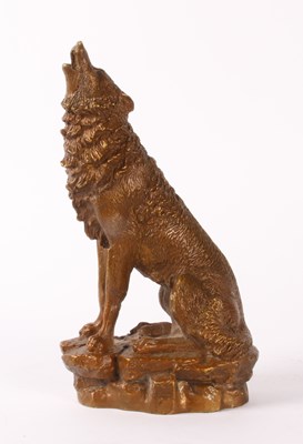 Lot 336 - A bronze model of a wolf, shown howling