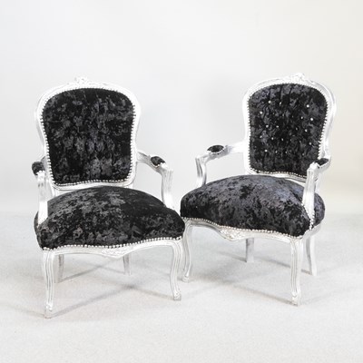 Lot 495 - A pair of modern silver painted and black...