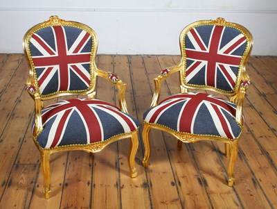 Lot 209 - A pair of carved gilt wood and Union Jack...