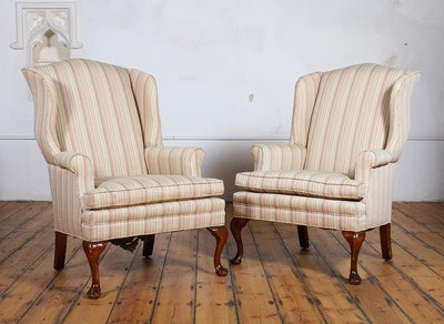 Lot 397 - A pair of striped wing back armchairs