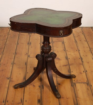 Lot 534 - A mahogany occasional table, with a green...