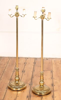 Lot 632 - A pair of brass standard lamps