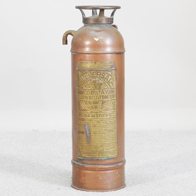 Lot 453 - A vintage style copper and brass fire...