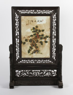 Lot 338 - A Chinese porcelain and fret carved ebonised...
