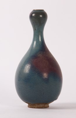 Lot 183 - A Chinese flambe glazed vase, having a garlic...