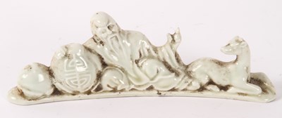 Lot 380 - A Chinese white porcelain brush rest