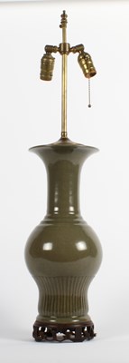 Lot 213 - A Chinese celadon glazed porcelain table lamp,...
