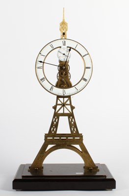 Lot 249 - A brass skeleton clock, in the form of the...