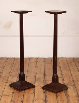 Lot 361 - A pair of mahogany column stands or torcheres,...
