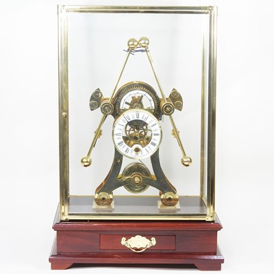 Lot 111 - A modern brass cased skeleton clock, of...