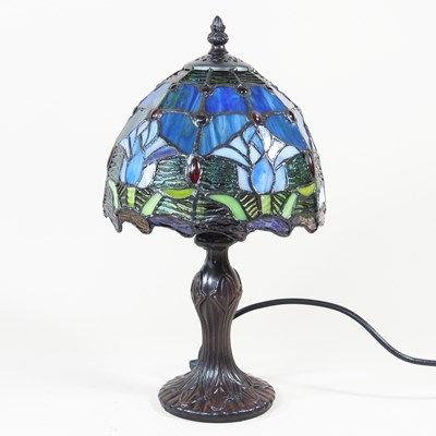 Lot 462 - A modern Tiffany style table lamp and shade,...