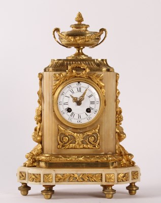 Lot 35 - A French marble and ormolu mounted mantel...