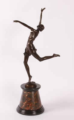 Lot 175 - An Art Deco style bronze figure of a girl, on...