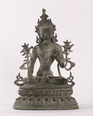 Lot 223 - A verdigris metal figure of Buddha, shown seated