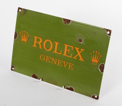 Lot 728 - An enamel on metal sign, inscribed Rolex