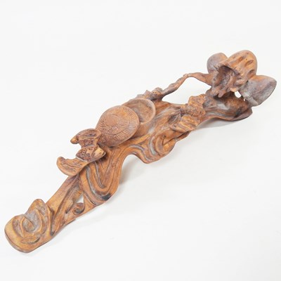 Lot 131 - A Chinese carved wooden rui sceptre, 40cm long