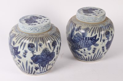 Lot 414 - A pair of Chinese blue and white ginger jars,...