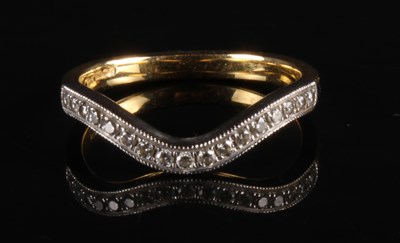 Lot 57 - An 18 carat gold and diamond dress ring, of...