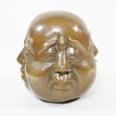 Lot 300 - An brass four-faced Buddha, 10cm high