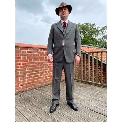 Lot 144 - A 1940's grey and white check woollen three piece suit