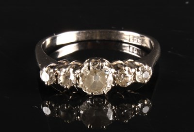 Lot 107 - An 18 carat white gold and diamond ring, the...