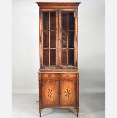 Lot 352 - A reproduction cabinet bookcase, by Theodore...