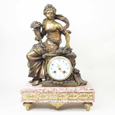 Lot 181 - An early 20th century French figural mantel...