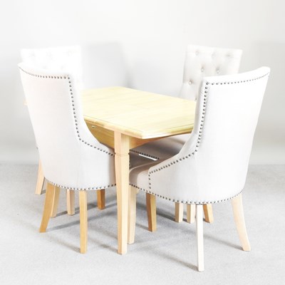 Lot 571 - A modern beech extending dining table,...