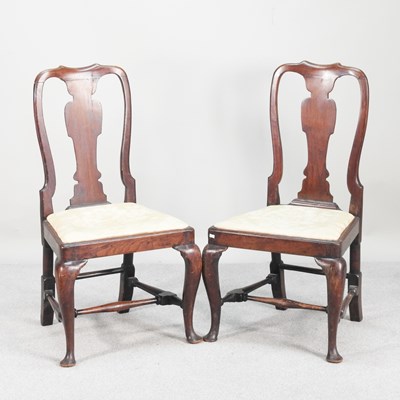 Lot 492 - A pair of 18th century walnut side chairs, on...