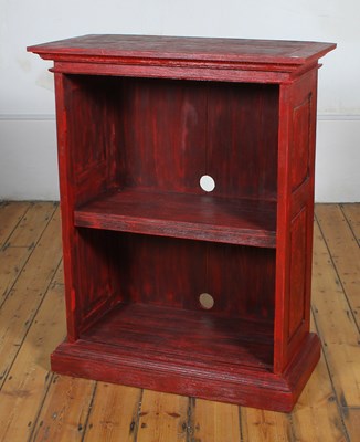 Lot 665 - An Eastern red painted hardwood bookcase, on a...