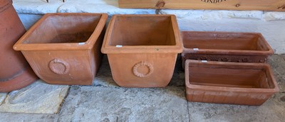 Lot 472 - A pair of terracotta garden pots, together...
