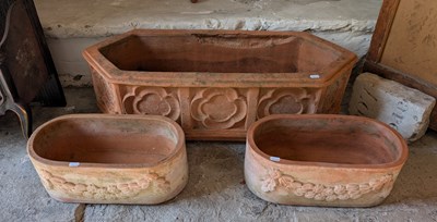 Lot 616 - A terracotta garden trough, together with a...