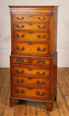 Lot 371 - A walnut tallboy chest of drawers, in the...