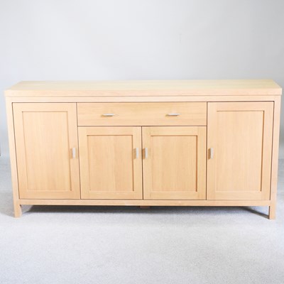 Lot 318 - A contemporary light oak sideboard, with a...
