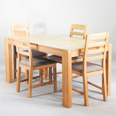 Lot 234 - A modern light oak dining table, together with...
