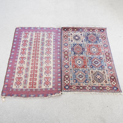 Lot 254 - An Afghan rug, with rows of hooked motifs, on...
